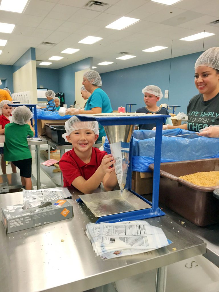 Feed My Starving Children is an awesome service opportunity for the whole family!- 101 East Valley and Phoenix Kids activities #phoenix #arizona #feedmystarvingchildren