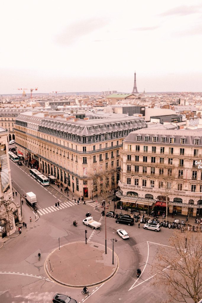 7 Spectacular Places to View the Eiffel Tower | Galleries Lafayette rooftop terrace #simplywander #paris #france #eiffeltower #gallerieslafayette