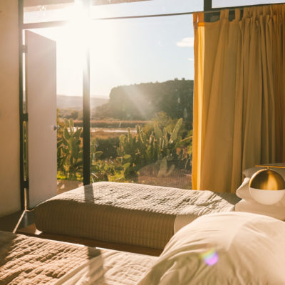 Arcosanti: One of the most unique places to stay in Arizona | Greenhouse Guest Room #arcosanti #arizona #simplywander