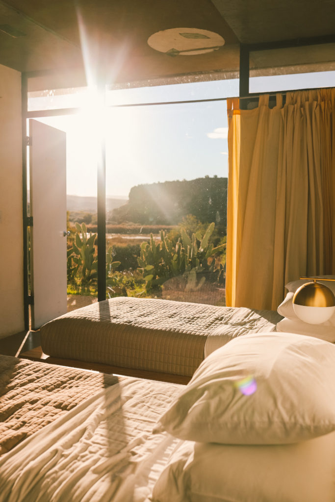 Arcosanti: One of the most unique places to stay in Arizona | Greenhouse Guest Room #arcosanti #arizona #simplywander