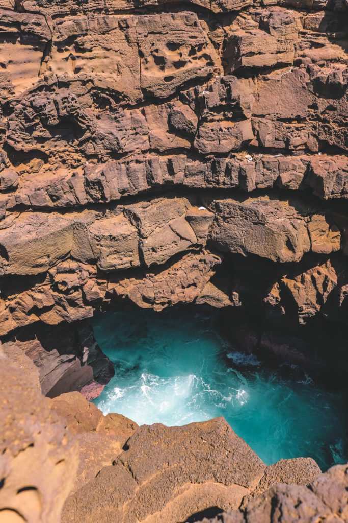 South Point Hawaii: A Big Island Hidden Gem | Cliff jumping at South Point #simplywander