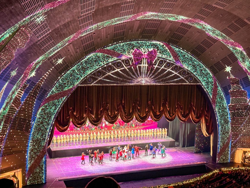 12 Bucket List Things to do In New York at Christmas | See the Rockette's Christmas Spectacular at Radio City Music Hall #simplywander